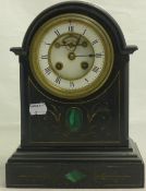 A Victorian black slate malachite inset mantle clock