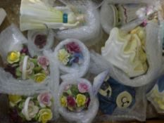 A quantity of Royal Doulton figurines, etc.