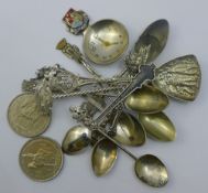 A quantity of souvenir spoons