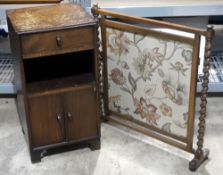 A barley twist fire screen, a pot cupboard,