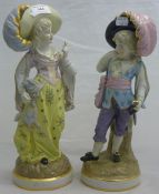 A pair of porcelain figures