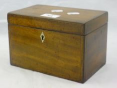 A Georgian mahogany tea caddy