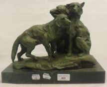 An abstract bronze model of foxes