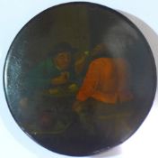 A 19th century papier mache snuff box decorated with figures in a tavern interior