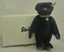 A modern boxed Steiff mohair teddy bear