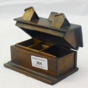An early 20th century treen house form stamp box