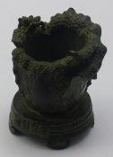 A small Chinese bronze cabbage and locust pot