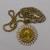 A gold sovereign and chain
