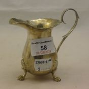 A small silver cream jug