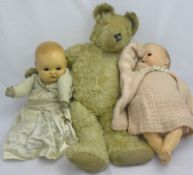 Two dolls and a teddy bear