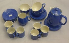 A small quantity of Moorcroft powder blue tea and coffee wares