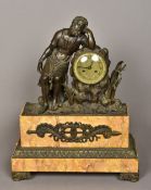 A bronze and marble mounted mantel clock The 3 1/4" dial with Roman numerals and bell striking