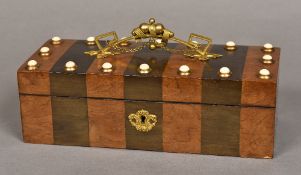 A 19th century French glove box Of hinged rectangular form, with ornate ormolu handle,