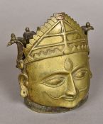 A 17th/18th century Indian bronze mukha-linga cover Modelled as the god Shiva, wearing a headdress,