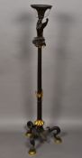 A 19th century patinated and gilt bronze torchere Of classical influence,