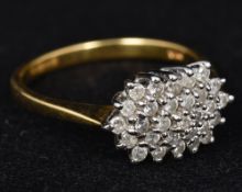 An 18 ct gold diamond cluster ring The diamonds totalling approximately 0.50 carat.
