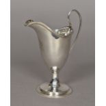 A George III Irish silver cream jug, hallmarked Dublin circa 1780,