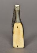 A Victorian ivory mounted pocket knife Formed as a Champagne bottle. 8 cm long.