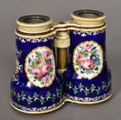 A pair of 19th century ivory mounted enamel decorated opera glasses,