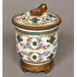 A Sevres type ormolu mounted porcelain pot and cover Decorated with floral garlands,