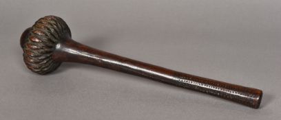 A 19th century Fijian ula (throwing club) Of typical form, with carved knop and chip carved handle.