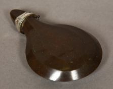 A 19th century carved hardstone snuff bottle Of faceted flattened form,