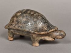 An antiquity, possibly Peruvian, pottery model of a tortoise Typically modelled. 22 cm long.