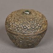 A 19th century Persian silver box and cover With overall embossed scrolling floral decoration,