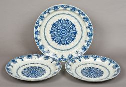 Three Dutch Delft blue and white chargers Each of dishes scalloped circular form,