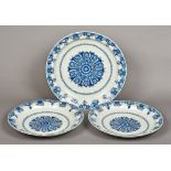 Three Dutch Delft blue and white chargers Each of dishes scalloped circular form,