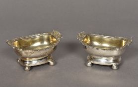 A pair of George III silver salts, hallmarked London 1810,