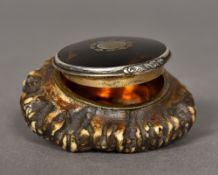 A 19th century unmarked silver and tortoiseshell mounted antler snuff box The hinged cover