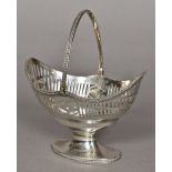 A George III silver pedestal basket, hallmarked London 1785,