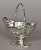 A George III silver pedestal basket, hallmarked London 1785,