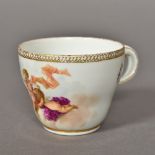 A 19th century Meissen porcelain cabinet cup Painted with cherubs and floral sprays and with double