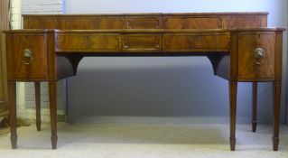 An early 19th century Scottish mahogany sideboard The breakfront top section with sliding