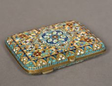 A gilded white metal enamel decorated cheroot case,