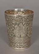 A 19th century Indian unmarked silver beaker Embossed in the round with figures,