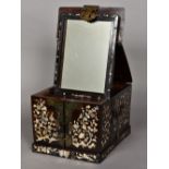 A Chinese mother-of-pearl inlaid hardwood travelling dressing table cabinet The hinged top