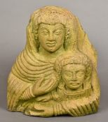 An Antique carved stone figural group,