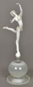 ISTVAN KOMAROMY (1910-1975) Germanic-Hungarian A glass figurine of a dancer Modelled balanced upon