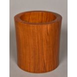 A Chinese carved hardwood brush pot Of cylindrical form. 14.5 cm high.