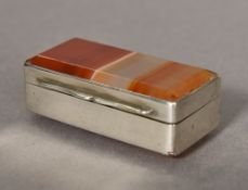 A 19th century unmarked silver agate set vesta case Of hinged rectangular form,