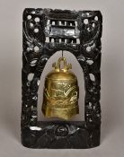 A Tibetan temple type bell Decorated in the round with a five clawed dragon,