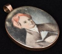 An early 19th century unmarked yellow metal framed miniature portrait on ivory Depicting a