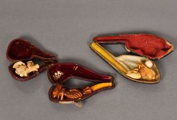 A 19th century German meerschaum pipe The bowl worked as a wasp; another,