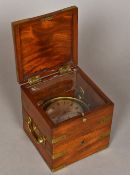 A 19th century marine chronometer The silvered dial with Roman numerals and subsidiary sweep