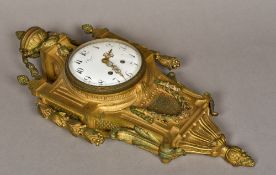 A gilt bronzed cased cartel clock The 6" white enamelled dial indistinctly signed and with Arabic