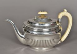 A George III silver teapot, hallmarked London 1806,