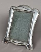 A George V silver photograph frame, hallmarked Birmingham 1920,